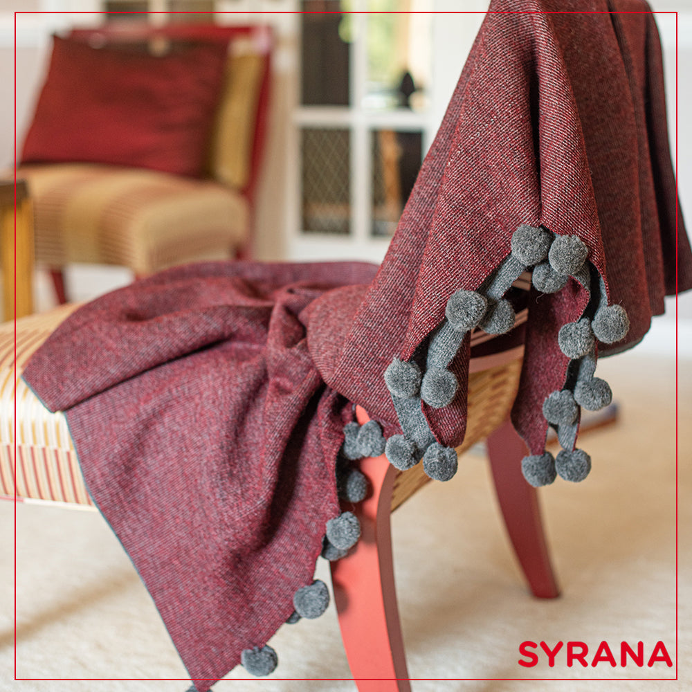 Blanket hand-knit with pure Baby Alpaca Fiber.